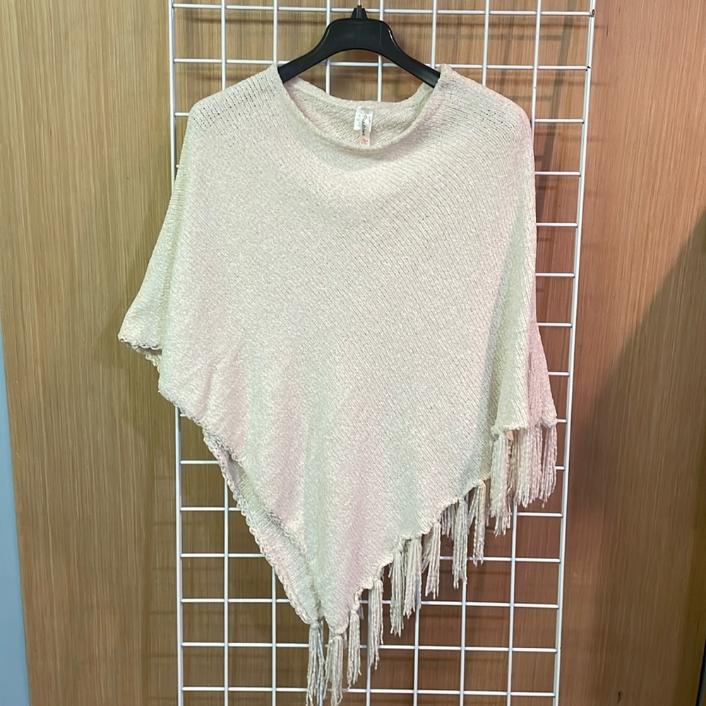 Pinklicious Shaw with fringes. Cream colored. NWT one size fits all.